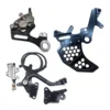Complete Surron Ultra Bee foot brake kit with dual caliper bracket, master cylinder, and brake pedal in black Surron Ultra Bee foot brake kit in silver with dual caliper bracket, rear caliper, master cylinder, and pedal assembly Upgraded Surron Ultra Bee V2 foot brake system with billet pedal, master cylinder, and mounts in black Silver Surron Ultra Bee dual caliper bracket for foot brake kit installation Surron Ultra Bee foot brake V2 kit in silver with pedal, master cylinder, and billet brackets Surron Ultra Bee dual caliper bracket in black finish for rear foot brake upgrade Surron Ultra Bee rear brake caliper with oem mount for dual caliper foot brake setup Surron Ultra Bee Footbrake Kit V2