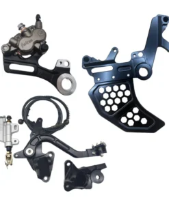 Complete Surron Ultra Bee foot brake kit with dual caliper bracket, master cylinder, and brake pedal in black Surron Ultra Bee foot brake kit in silver with dual caliper bracket, rear caliper, master cylinder, and pedal assembly Upgraded Surron Ultra Bee V2 foot brake system with billet pedal, master cylinder, and mounts in black Silver Surron Ultra Bee dual caliper bracket for foot brake kit installation Surron Ultra Bee foot brake V2 kit in silver with pedal, master cylinder, and billet brackets Surron Ultra Bee dual caliper bracket in black finish for rear foot brake upgrade Surron Ultra Bee rear brake caliper with oem mount for dual caliper foot brake setup Surron Ultra Bee Footbrake Kit V2